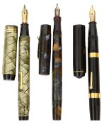 Two Conway Stewart lever fill fountain pens and a Mabie Todd Swan Minor