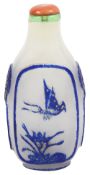 A Chinese blue overlay opaque white Peking glass snuff bottle