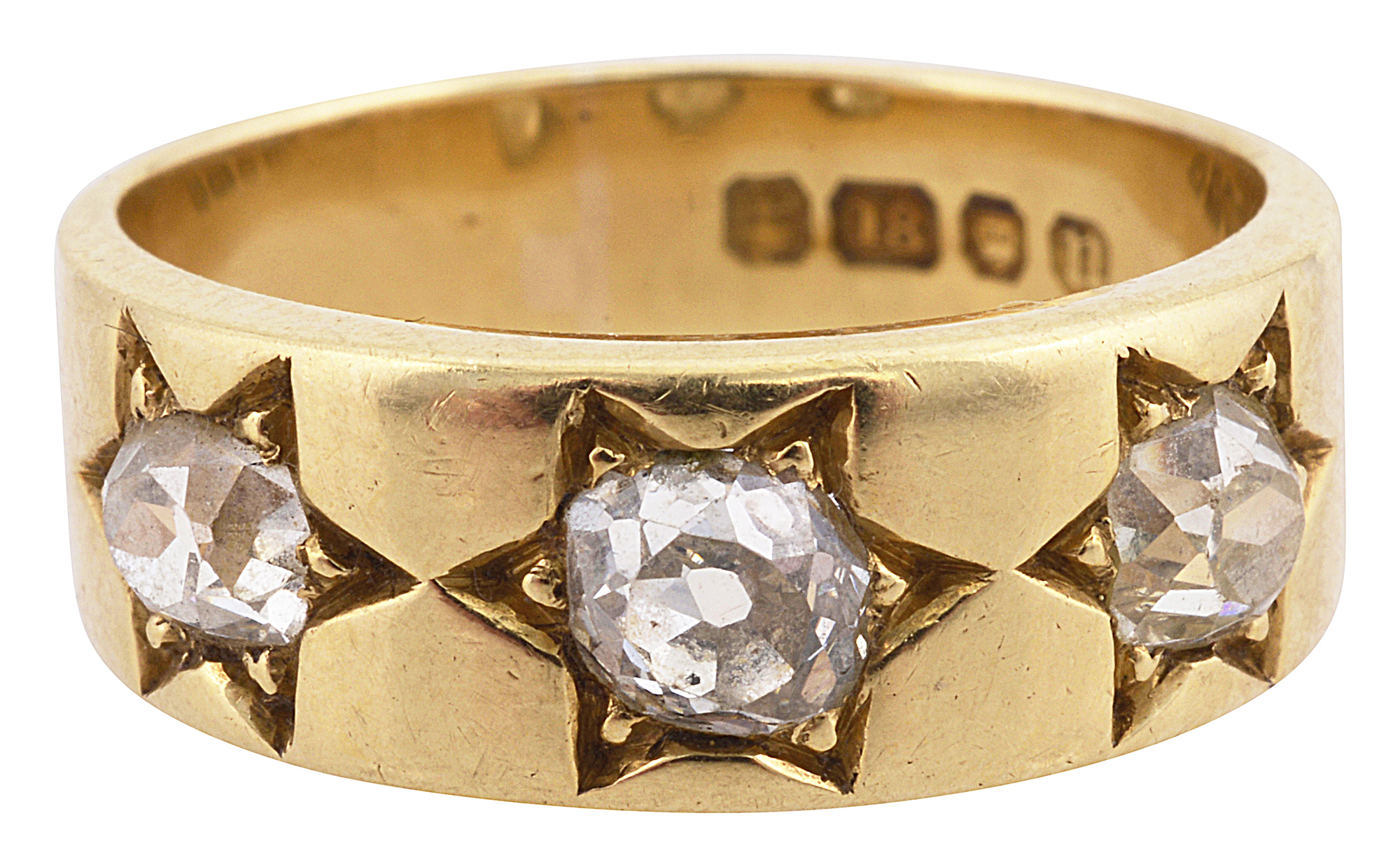 A three stone 18ct gold band