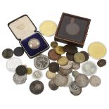 A collection of mostly silver and other coins and medals