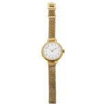 A Longines lady's 18ct bracelet wristwatch