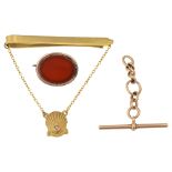 A carnelian brooch, 9ct tie clip and part of a 15ct chain