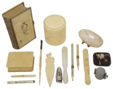 A collection of ivory writing accessories, including two Lund pencils