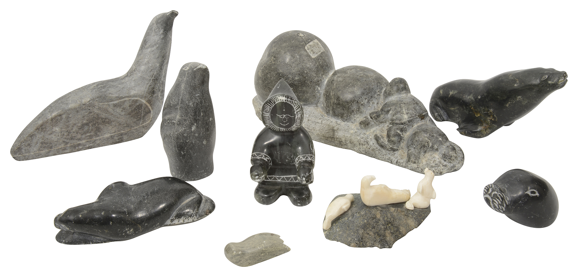 Nine Inuit stone carvings