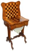 A mid Victorian figured walnut serepntine shaped games table