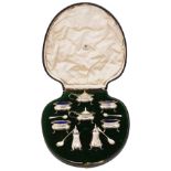 A cased George V eight piece silver cruet set