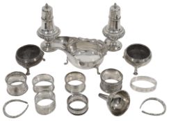 A collection of silver to include a pair George III cauldron salts, others
