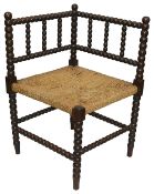 A 19th century bobbin turned corner chair