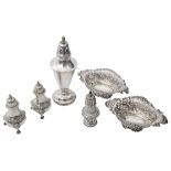 A pair of Edwardian silver pepper casters, a sugar caster; others