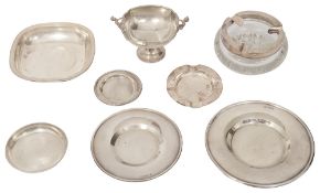 A collection of silver ashtrays and dishes