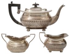 A late Victorian matched three piece silver tea service