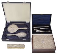 A modern cased dressing table set, a silver mounted jewellery box, others