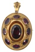 A mid Victorian garnet and yellow gold brooch/locket