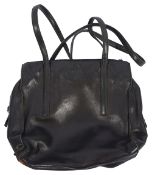 A vintage black leather Prada handbag