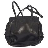 A vintage black leather Prada handbag