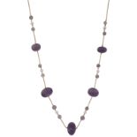 A carved amethyst and cultured pearl long chain necklace