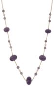 A carved amethyst and cultured pearl long chain necklace