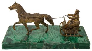 A late 19th century Russian gilt metal model in the form of horse drawn troika