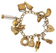 A 9ct gold charm bracelet with numerous charms