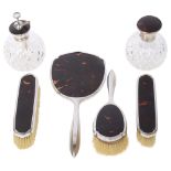 A George V silver and tortoiseshell six piece dressing table set