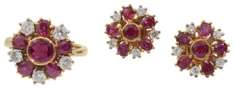 A ruby and diamond cluster ring together with a pair of ruby and cluster earrings en suite