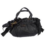 A Prada black leather bow tote bag