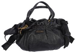 A Prada black leather bow tote bag