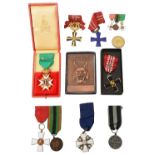 A Swedish gold and white enamel Order Of Vasa, and other Finnish medals