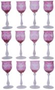 A set of twelve cranberry flashed 'Rock Crystal' cut wine glasses c.1910