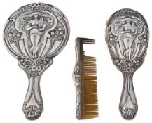 An Edwardian silver Art Nouveau three piece dressing table set