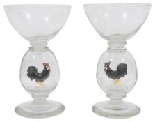A pair of novelty hollow blown stem wine glasses in the style of Williams and Stevens C.1930