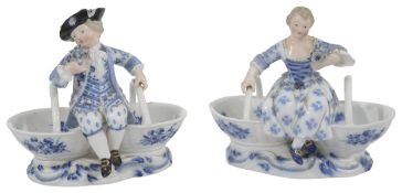 A pair of late 19th century Meissen figural double table salts