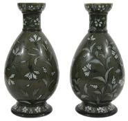 A pair of 19thC. Doulton Lambeth faience Iznik style vases decorated by Minna L Crawley