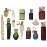 A collection of 19th century glass scent and smelling salt bottles