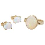 An opal ring and a pair of opal ear studs