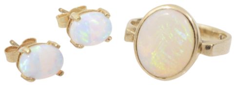 An opal ring and a pair of opal ear studs