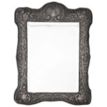 An Edwardian silver framed dressing table mirror