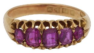 An Edwardian graduated five stone pink sapphire ring