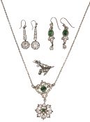 Four items of paste-set jewellery