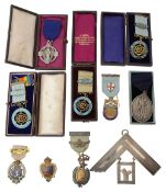 A large Masonic silver collar jewel and a selection of moslty silver jewels