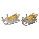 A pair of late Victorian novelty silver 'sleigh' sauce boats, London