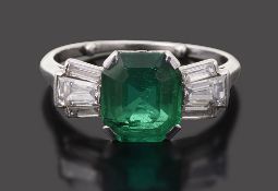 An emerald and diamond-set ring