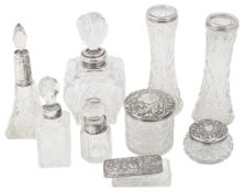 Edwardian and later silver mounted cut glass, scent bottles and jars