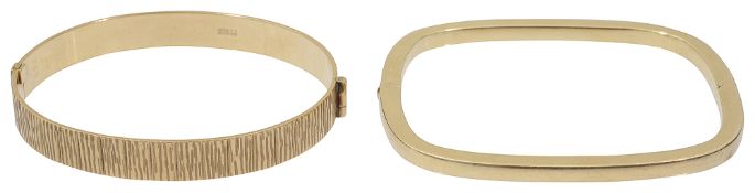 A 9ct stiff bangle together with a hollow bangle