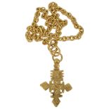 A vintage Chanel gold tone cross pendant and chain