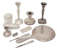 A collection of silver to include an Ewardian hand mirror