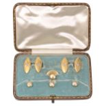 An Edwardian cased set of 18ct gold and diamond set cufflinks and studs