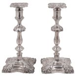A pair of modern silver candlestick in George II style
