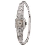A lady's Art Deco diamond-set and platinum watch