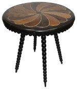 A 19th century Ceylonese ebony and specimen wood occasional table